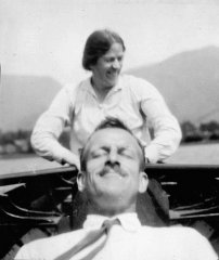 June 1933: Grasmere, Mildred takes the oars while Cyril relaxes!