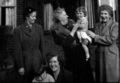 1954, the year of Mildred's retirement. Mildred is holding Kathy (my twin), flanked by Granny Hooke and Great Aunt Ella. In the foreground are my mum, Valerie Hooke and I (Graham).