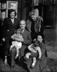 1954: Twins, Kathy and I, securely held by Granny (Elaine) & Grandpa (Cyril) Hooke with Mum (Valerie Hooke) and Mildred.